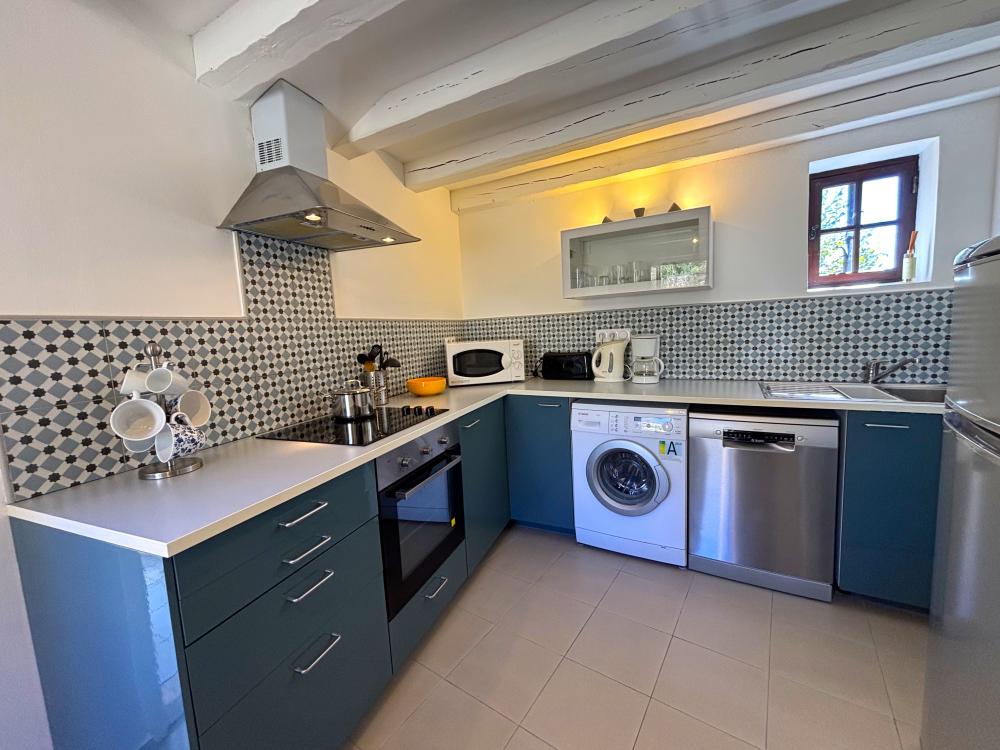 The open plan kitchen is perfectly fitted to cook in 