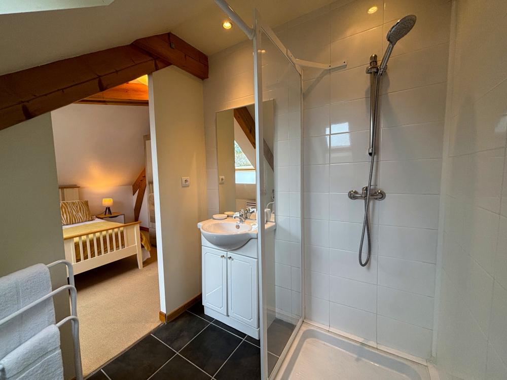 It enjoys a private shower room 