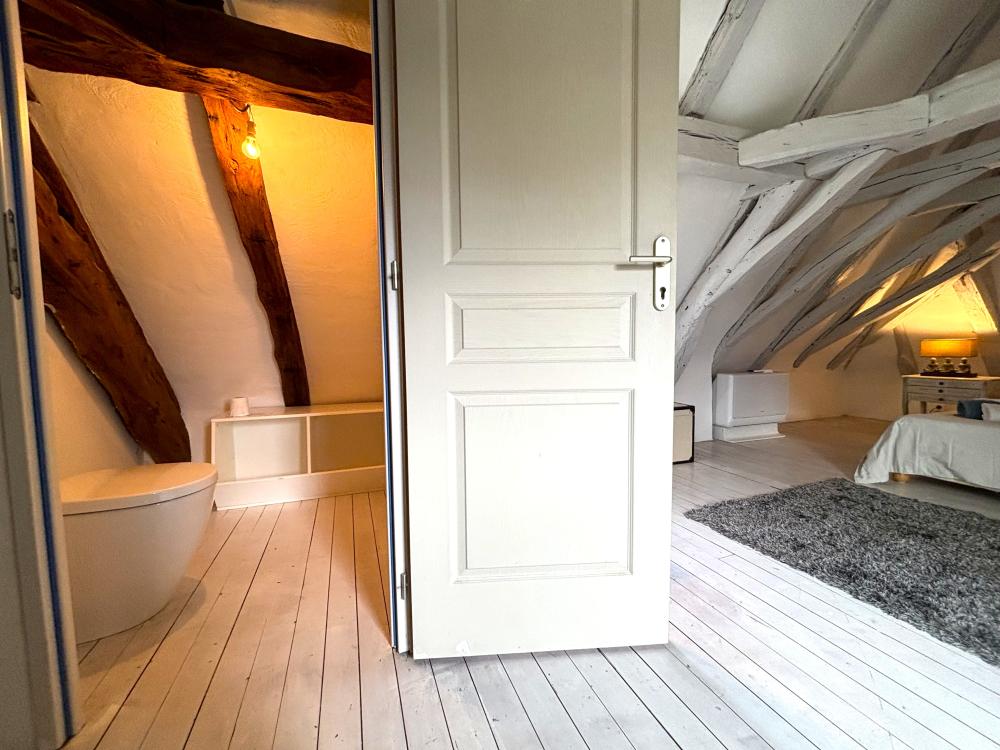 The third double bedroom enjoys a washbasin and toilet