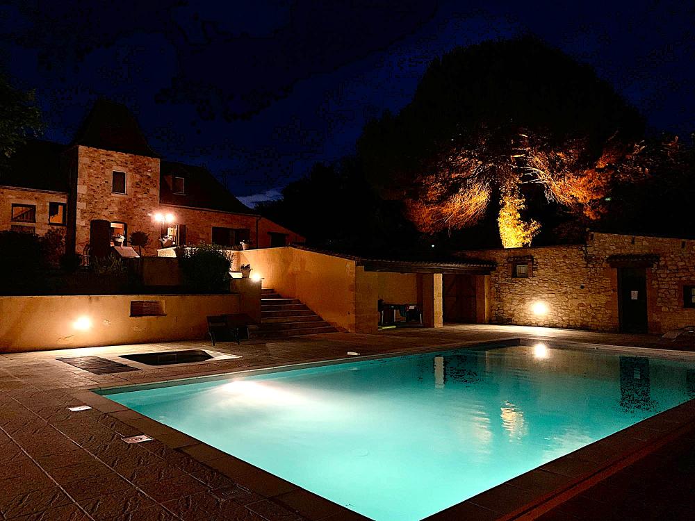 The house and pool by night