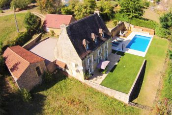 the house pool and garden 
