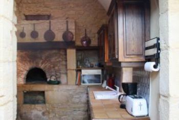 the kitchen with the original bread oven