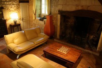 the cosy salon with original fireplace