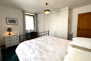 The spacious master bedroom at 1st floor