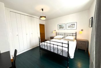 The spacious master bedroom at 1st floor