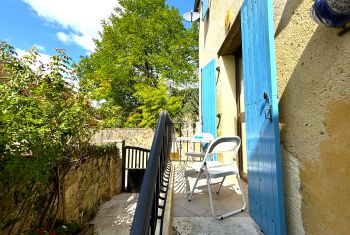 It leads to a lovely balcony, ideal to enjoy a drink 
