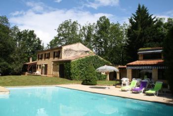The main house with the summer house