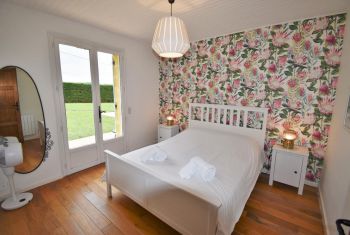 The second double bedroom also opening onto the garden