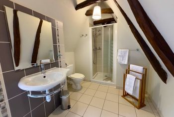 the adjacent large shower room 