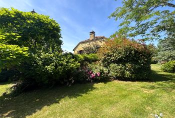 The house from its fully enclosed garden 