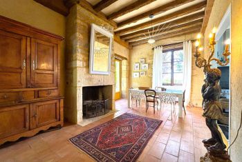 the formal dining area leads to the kitchen
