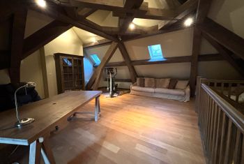 The office/sitting room at mezzane level, over the kitchen area