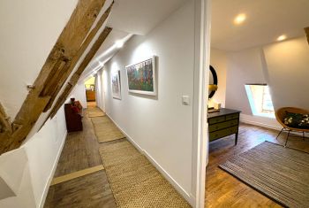 The corridor leading to the 3 bedrooms at groundfloor