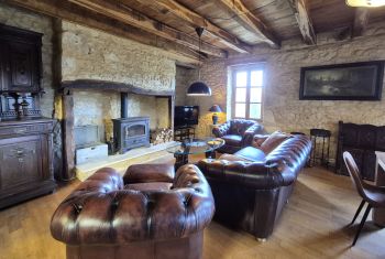 with leather chesterfield sofa and armchairs