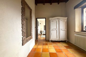 The hall leading to the sleeping area with 2 bedrooms and 1 bathroom