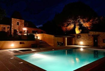 The house and pool by night